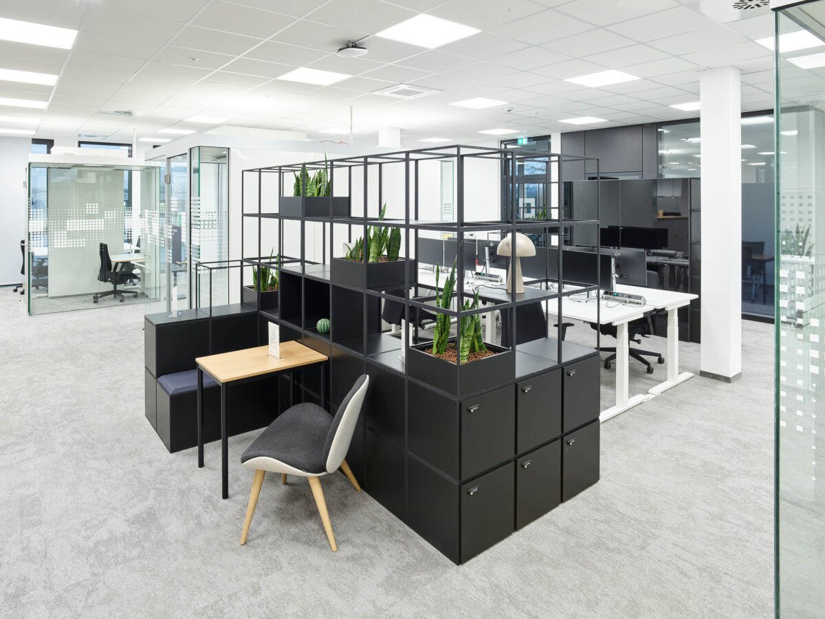 The design goes to maximize synergies between the various departments and teams. 